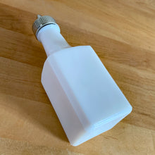 Load image into Gallery viewer, Classic vintage white milk glass vinegar dispenser, featuring blue cornflowers and a plasticized chrome lid. Crafted by Dominion Glass Canada, circa 1970.  In excellent condition&nbsp;with only minor wear to the chrome, the glass is free from chips/cracks.  Measures 2 x 2 x 6 inches
