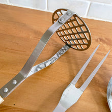 Load image into Gallery viewer, Close-up of vintage stainless steel potato masher with grid head and two-tine fork from Japanese kitchen utensil set, riveted steel
