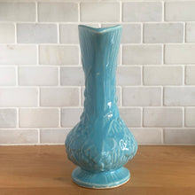 Load image into Gallery viewer, Vintage Art Deco gloss blue Rustic Line handled pitcher vase with embossed grapevines. Crafted by McCoy Pottery, 1945. This rare piece is must for any McCoy art pottery collector!

In excellent vintage condition, no chips/cracks/repairs. Maker&#39;s mark.

Measures 5 1/4 x 9 inches
