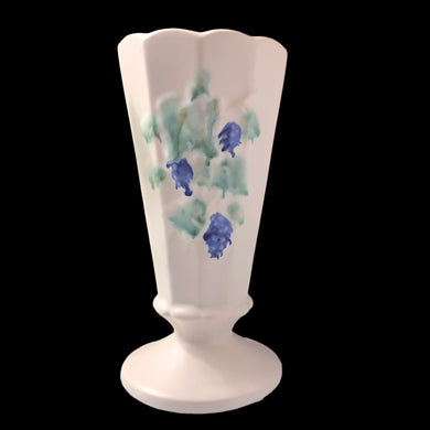 Creamware is a favourite of ours. This sweet Art Deco paneled trumpet shape art pottery footed vase features embossed blue grapes and green leaves. Crafted by McCoy, USA, circa 1940s. Perfect for display or a lovely floral bouquet. In excellent condition, free from chips/cracks/repairs. Measures 3 1/2 x 7 inches