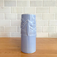 Load image into Gallery viewer, Vintage Art Deco matte blue Castle Gate Butterfly Line vase. Crafted by Nelson McCoy Pottery, early 1940s. This rare piece is must for any art pottery collector!

In excellent condition, no chips/repairs, crack, see photos. Unmarked.

Measures 7 3/8 x 2 1/2 x 6 inches
