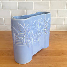 Load image into Gallery viewer, Vintage Art Deco matte blue Castle Gate Butterfly Line vase. Crafted by Nelson McCoy Pottery, early 1940s. This rare piece is must for any art pottery collector!

In excellent condition, no chips/repairs, crack, see photos. Unmarked.

Measures 7 3/8 x 2 1/2 x 6 inches
