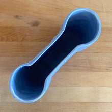 Load image into Gallery viewer, Vintage Art Deco matte blue Castle Gate Butterfly Line vase. Crafted by Nelson McCoy Pottery, early 1940s. This rare piece is must for any art pottery collector!

In excellent condition, no chips/repairs, crack, see photos. Unmarked.

Measures 7 3/8 x 2 1/2 x 6 inches
