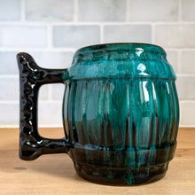 Load image into Gallery viewer, Opposite side view detail of the barrel mug in green drip glaze, showing the handle's full textured profile
