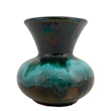 Load image into Gallery viewer, Side view of 1970s Canadian Blue Mountain Pottery bud vase with flared rim
