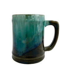 Load image into Gallery viewer, Side view of Blue Mountain Pottery green drip glaze mug showing teal and dark brown glaze graduation and squared handle
