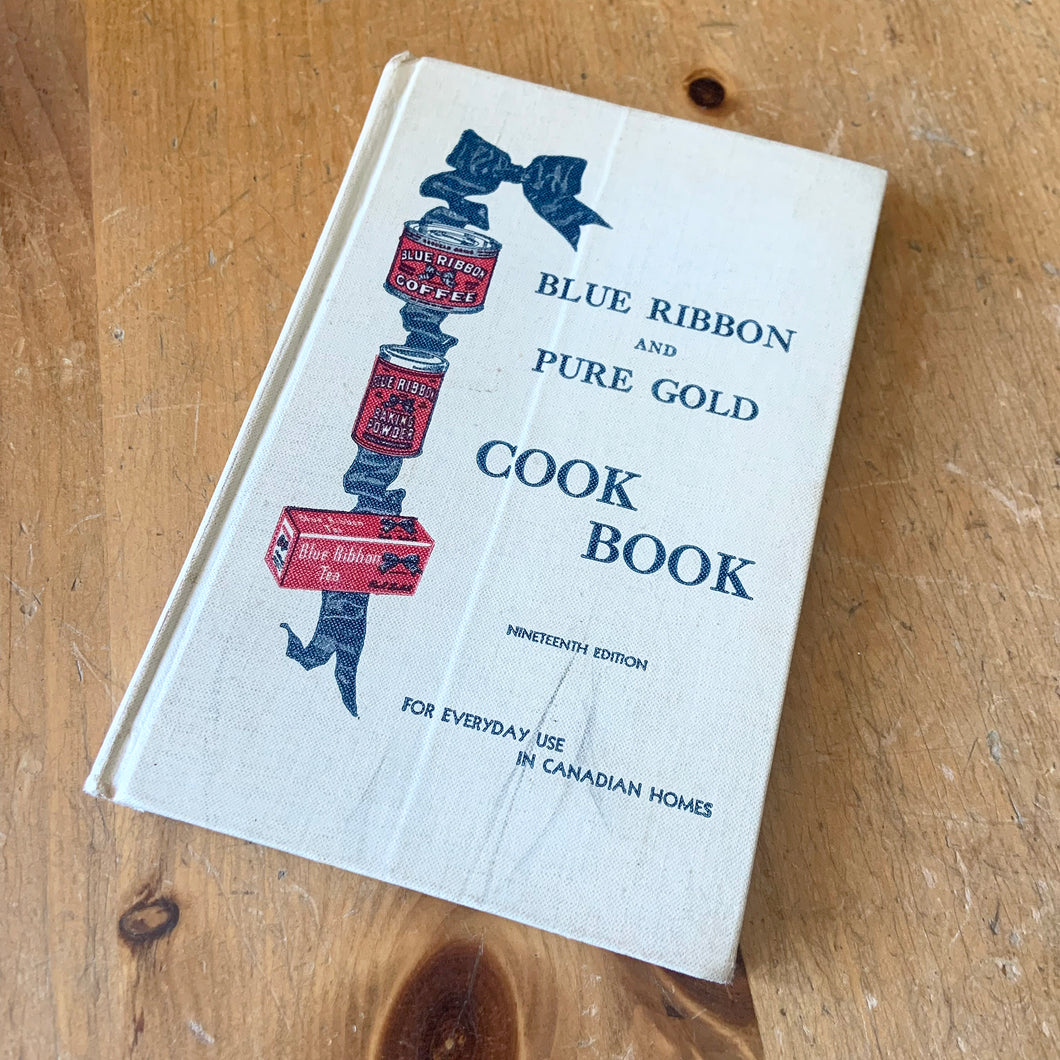This vintage hardcover Blue Ribbon and Pure Gold Cook Book – For Everyday Use in Canadian Homes is a jam-packed collection of recipes using Pure Gold Manufacturing Company products. 158 pages filled with cooking techniques, hundreds of recipes and extensive index. 19th Edition, 1946 and retains one of the four original mail-in coupons at the front of the book. There are six pages of vibrant colour advertisements for Blue Ribbon and Pure Gold products.