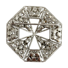 Load image into Gallery viewer, Reverse of vintage octagonal blue rhinestone brooch showing silver-tone openwork back and rollover safety pin clasp
