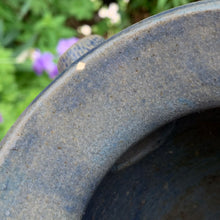 Load image into Gallery viewer, Rare vintage blue stoneware batter jug or pitcher decorated with panels of a figure playing a lyre against a stippled ground with decorative details. Crafted by Robinson Ransbottom Pottery Co., USA, 1920s.

In good used vintage condition, minor flea bites to the rim and foot. Normal age-related crazing. Unmarked.

Measures 9 x 10 1/2 inches (incl. spout/handle)

