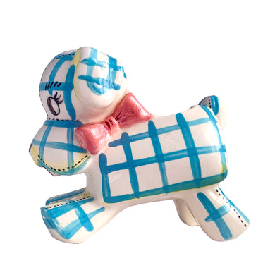 Adorable kitschy white puppy dog planter with blue stripes, black stitching and a pink bow. Crafted by Napco, Japan, 1950s. A sweet addition for your new addition. Use for tiny plants or repurpose to hold baby accessories.

In excellent as found vintage condition, no chips/cracks/repairs, normal crazing present.

Measures 5 3/4 x 3 x 5 1/4 inches