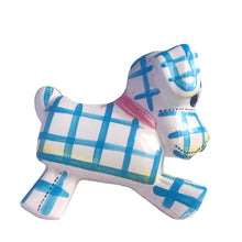 Load image into Gallery viewer, Adorable kitschy white puppy dog planter with blue stripes, black stitching and a pink bow. Crafted by Napco, Japan, 1950s. A sweet addition for your new addition. Use for tiny plants or repurpose to hold baby accessories.

In excellent as found vintage condition, no chips/cracks/repairs, normal crazing present.

Measures 5 3/4 x 3 x 5 1/4 inches
