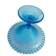 Load image into Gallery viewer, Exquisite blue glass pedestal compote featuring a textured exterior finish and crimped edge. Crafted by Zabkowice Glassworks, Poland, circa 1970s. Enhance your home decor with this stunning piece of art glass! In excellent condition, free from chips. Measures 11 x 8 inches
