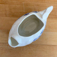 Load image into Gallery viewer, Vintage figural chicken ironstone creamer featuring blue transferware florals. Crafted by Crown Devon Fieldings, England, 1930s. Add a touch of cottage charming to your tableware with this adorable creamer.

In excellent condition, no chips/cracks/repairs, crazing and minor staining present. Marked Crown Devon Fieldings Staffordshire England Acid Resistant.

Measures 5 1/4 x 3 x 3 3/4 inches
