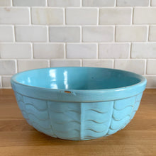 Load image into Gallery viewer, Vintage blue ceramic mixing bowl 308, with an exterior pattern of horizontal waves. Crafted by Robinson Ransbottom Pottery Co., USA, 1960s. A beautiful piece to add to your art pottery collection!

In as found condition, chips to the rim and foot, no cracks/repairs, manufacturer&#39;s glaze pops and age-related crazing. Maker&#39;s marks, number 308.

Measures 8 3/4 x 3 1/2 inches
