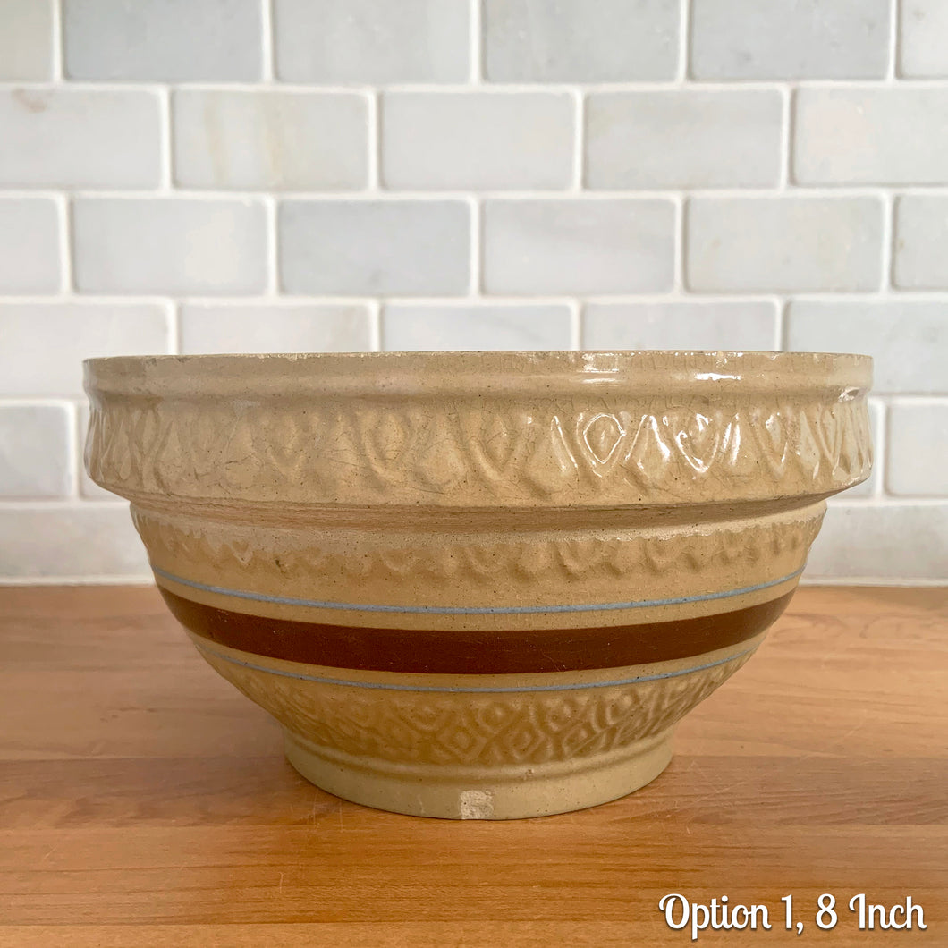 Vintage yellow ware mixing bowl featuring brown and blue bands with diamond pattern. Crafted by Robinson Ransbottom, USA, 1930s. A well-crafted piece of stoneware offering a nostalgic vibe to your farmhouse or cottage kitchenware and decor!

OPTIONS

Option 1, 8 Inch: Measures 8 3/16 x 4 3/8 inches. In as found condition, chips to the foot and rim, no cracks/repairs, age-related crazing. Crown mark.
