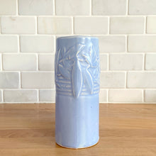 Load image into Gallery viewer, Vintage Art Deco matte blue Castle Gate Butterfly Line vase. Crafted by Nelson McCoy Pottery, early 1940s. This rare piece is must for any art pottery collector!

In excellent condition, no chips/repairs, crack, see photos. Unmarked.

Measures 7 3/8 x 2 1/2 x 6 inches
