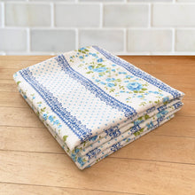 Load image into Gallery viewer, Pair of vintage Vendome pillowcases in the blue colourway. This pattern features bands of blue roses alternating with blue polka dots separated by a decorative blue band on a white, no iron muslin, 50% cotton / 50% polyester. Cannon Royal Family, USA, 1975/76. A beautiful way to add vintage charm to your bedroom decor!

In excellent condition, no stains/tears and the colours are vibrant and appears barely used.

31 x 20 1/2 inches

