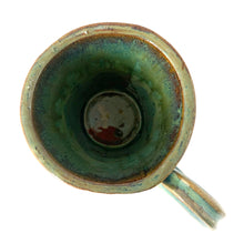 Load image into Gallery viewer, Vintage watery blue, green, ochre high fired drip glaze studio pottery mug featuring applied and debossed dragonflies with sculpted handle and scalloped base. Signed AA. This gorgeous one-of-a-kind handmade vessel is perfect for any hot beverage.

In excellent condition, no chips, cracks or repairs. Typical manufacturing glaze bubbles.

Measures 3 7/8 x 5 1/2 inches (5 7/8" incl. handle)

Capacity 16oz
