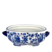 Load image into Gallery viewer, Elevated three-quarter view of Bombay Company blue and white chinoiserie oval jardiniere, showing the smooth white glazed interior, cobalt rim line, and butterfly floral exterior pattern
