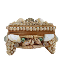 Load image into Gallery viewer, A charming mid-century artisan made trinket box handcrafted in Bremen, Germany, where maritime heritage runs deep despite the city's inland location. This piece exemplifies the golden age of shell art—a beloved souvenir tradition that flourished aboard luxury ocean liners like the SS Bremen and in European coastal gift shops. The wooden base is adorned with genuine shells, creating an authentic tactile surface that captures the romance of vintage travel. 
