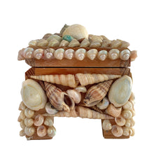 Load image into Gallery viewer, A charming mid-century artisan made trinket box handcrafted in Bremen, Germany, where maritime heritage runs deep despite the city's inland location. This piece exemplifies the golden age of shell art—a beloved souvenir tradition that flourished aboard luxury ocean liners like the SS Bremen and in European coastal gift shops. The wooden base is adorned with genuine shells, creating an authentic tactile surface that captures the romance of vintage travel. 
