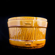 Load image into Gallery viewer, Vintage figural bucket ceramic pottery planter in a toffee coloured glaze. Produced UPCO, USA, circa 1970s. In as found vintage condition, 2 minor chips to the top bucket strap and a crack on the side. The planter is still useable. We recommend using it in conjunction with a liner. Stabilized the crack with epoxy or a weatherproof glue such as E6000. This pot is a fantastic piece and well worth the effort to give it a long life. Measures 7 x 4 3/8 inches
