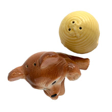 Load image into Gallery viewer, Vintage brown bear hugging a beehive ceramic salt and pepper shakers with plastic stoppers. Japan, 1970s. Add these adorable kitschy shakers to your collection!

In excellent condition, no chips/cracks/repairs. Marked Japan.

Bear measures 3 1/4 x 2 1/2 x 4 5/8 inches

Beehive measures 2 1/4 x 2 7/8 inches
