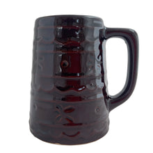 Load image into Gallery viewer, Vintage Daisy and Dots old fashioned stoneware beer stein or mug featuring a deep brown glaze decorated with a Pennsylvania Dutch pattern of daisy, dots, on bands with scalloped design and smooth rim. A lovely&nbsp;early American farmhouse themed mug, perfect for enjoying your favourite beer or beverage.

In excellent condition, no chips/cracks/repairs.

Measures 4 1/2 x 3 3/4 x 5 1/8 inches (incl. handle)

Capacity 16 ounces
