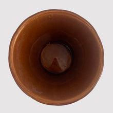 Load image into Gallery viewer, Striking vintage gloss brown Series 116 ribbed planter pot with attached saucer. Crafted by McCoy Pottery, 1940s. This rare planter is must for any McCoy art pottery collector!

In good vintage condition, flea bite at rim, hard water residue. Maker&#39;s mark on the bottom.

Measures 6 x 5 inches
