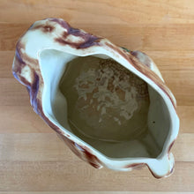 Load image into Gallery viewer, Rare vintage retro figural brown squirrel ceramic cookie jar. Crafted by McCoy Pottery, USA, 1950s. A good sized canister for a large batch of cookies. A great gift for the art pottery collector or animal lover. A whimsical piece that will look wonderful as part of your kitchen decor!

In vintage condition, no chips/cracks/repairs. There is age related crazing with staining at the bottom of the jar. Maker&#39;s mark.

Measures 8 x 6 x 10 1/2 inches
