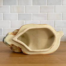 Load image into Gallery viewer, Rare vintage retro figural brown squirrel ceramic cookie jar. Crafted by McCoy Pottery, USA, 1950s. A good sized canister for a large batch of cookies. A great gift for the art pottery collector or animal lover. A whimsical piece that will look wonderful as part of your kitchen decor!

In vintage condition, no chips/cracks/repairs. There is age related crazing with staining at the bottom of the jar. Maker&#39;s mark.

Measures 8 x 6 x 10 1/2 inches
