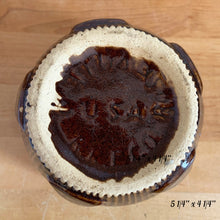 Load image into Gallery viewer, Close-up of the Robinson Ransbottom Pottery Co, USA maker's mark stamped into the base of the 5-inch planter
