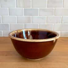 Load image into Gallery viewer, Vintage brown drip glaze oven-proof mixing bowls with rolled edge. Crafted by Hull Pottery, USA, 1960s. What a fabulous way to prepare or serve your favourite dish!

In excellent condition, no chips/cracks/repairs. Maker&#39;s marks.

7 Inch Bowl Measures: 7 1/4 x 3 1/2 inches, in excellent vintage condition, no chips/cracks/repairs, minor wear. Maker&#39;s marks.
