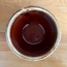 Load image into Gallery viewer, Vintage brown drip glaze oven-proof mixing bowls with rolled edge. Crafted by Hull Pottery, USA, 1960s. What a fabulous way to prepare or serve your favourite dish!

In excellent condition, no chips/cracks/repairs. Maker&#39;s marks.

7 Inch Bowl Measures: 7 1/4 x 3 1/2 inches, in excellent vintage condition, no chips/cracks/repairs, minor wear. Maker&#39;s marks.
