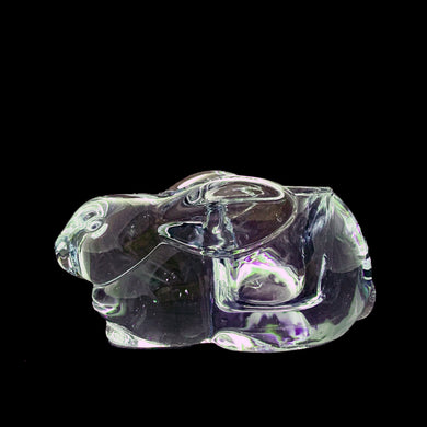Adorable clear pressed glass figural bunny rabbit votive or tealight candle holder. Crafted by Indiana Glass, USA, circa 1980s.  In excellent condition, no chips or cracks. Includes tea light candle.  Measures 4 1/2 x 3 x 2 1/2 inches