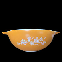 Load image into Gallery viewer, Set of four vintage Butterfly Gold 2 Cinderella nested mixing bowls. including the 441, 442, 443 and 444 sizes This classic was designed by Gregory Mirow and produced by PYREX, USA, 1979-1981. This version of the pattern features an asymmetrical flower and butterfly pattern in white alternating on golden-orange or golden-yellow ground. A must for the vintage kitchen and PYREX enthusiast!

Bowls are in excellent condition, shiny, no chips.
