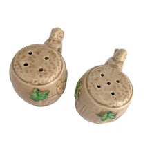 Load image into Gallery viewer, Vintage souvenir ceramic salt and pepper shakers featuring an embossed Canadian Mounted Police on horseback, green maple leaves and darling baby rabbit handles finished in tan coloured glaze. Crafted in Japan, 1950s. A sweet set of collectible shakers to use or display!  In excellent condition, no chips/cracks/repairs. No corks.  Measures 2 3/4 x 2 1/8 inches
