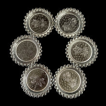 Load image into Gallery viewer, Set of six vintage Candlewick clear glass coasters impressed with grapevines and the distinctive Imperial Candlewick beaded edge. Crafted by Imperial Glass, USA, circa 1960s. The perfect way to protect your furniture and look great doing it! In great vintage condition, free from chips. Two coasters have a bit of roughness on the edge. Measures 4 x 5/8 inches
