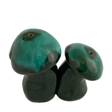 Load image into Gallery viewer, Front three-quarter view of Canuck Pottery Evangeline green drip glaze mushroom-shaped salt and pepper shakers, Canada, 1960s–70s

