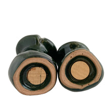 Load image into Gallery viewer, Underside of Canuck Pottery Evangeline green drip glaze salt and pepper shakers showing unglazed bases with original corks intact
