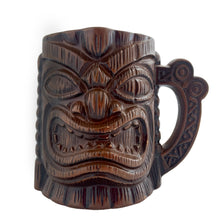 Load image into Gallery viewer, Groovy collectible vintage caramel brown handled tiki mug. Crafted by Orchids of Hawaii, Japan, 1950s. The perfect tropical addition to your retro drinkware collection!

In good vintage condition, no chips. Marked Orchids of Hawaii Japan

Measures 4 1/2 x 3 x 4 inches (incl. handle)
