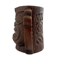 Load image into Gallery viewer, Groovy collectible vintage caramel brown handled tiki mug. Crafted by Orchids of Hawaii, Japan, 1950s. The perfect tropical addition to your retro drinkware collection!

In good vintage condition, no chips. Marked Orchids of Hawaii Japan

Measures 4 1/2 x 3 x 4 inches (incl. handle)
