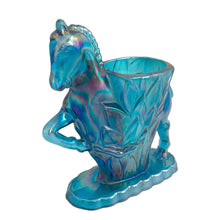 Load image into Gallery viewer, Vintage limited edition Carols Sure Win iridescent Mediterranean Blue Carnival Glass bud vase featuring a horse prancing through vegetation. Made for Cherished Glass Wares by L.E. Smith Glass, USA, 1970s. Production of these vases was limited to approximately 2000 per colour and was produced in Amber, Amberina, Mediterranean Blue and Crystal Lustre.

In excellent condition, no chips. There is a minor rough spot at the seam likely due to mold release.

Measures 4 1/4 x 1 7/8 x 5 1/4 inches
