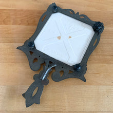 Load image into Gallery viewer, Base view of vintage cast iron trivet with white tile insert featuring strawberries on the vine. Seven Star, Taiwan, 1970s
