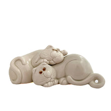 Load image into Gallery viewer, Vintage hand painted Cat Nap white ceramic salt and pepper shakers. Fitz &amp; Floyd, Japan, 1980s. Add these adorable snuggling shakers to your collection!

In excellent condition, no chips/cracks/repairs. Impressed maker&#39;s marks and stickers..

Measures 4 x 3 x 1 3/4 inches
