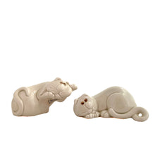 Load image into Gallery viewer, Vintage hand painted Cat Nap white ceramic salt and pepper shakers. Fitz &amp; Floyd, Japan, 1980s. Add these adorable snuggling shakers to your collection!

In excellent condition, no chips/cracks/repairs. Impressed maker&#39;s marks and stickers..

Measures 4 x 3 x 1 3/4 inches
