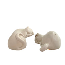 Load image into Gallery viewer, Vintage hand painted Cat Nap white ceramic salt and pepper shakers. Fitz &amp; Floyd, Japan, 1980s. Add these adorable snuggling shakers to your collection!

In excellent condition, no chips/cracks/repairs. Impressed maker&#39;s marks and stickers..

Measures 4 x 3 x 1 3/4 inches
