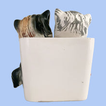 Load image into Gallery viewer, RARE vintage mid-century era kitsch anthropomorphic ceramic wall pocket planter featuring two cats sitting atop a pink cushion. Crafted by Lefton, Japan, 1950s. The perfect addition to your planter or cat collection!  In great vintage condition, tiny flea bite of the pink ear, no cracks/repairs. Marked ESD Japan Hand Painted 7229.  Measures 4 3/4 x 3 1/4 x 5 1/4 inches
