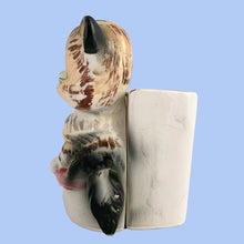 Load image into Gallery viewer, RARE vintage mid-century era kitsch anthropomorphic ceramic wall pocket planter featuring two cats sitting atop a pink cushion. Crafted by Lefton, Japan, 1950s. The perfect addition to your planter or cat collection!  In great vintage condition, tiny flea bite of the pink ear, no cracks/repairs. Marked ESD Japan Hand Painted 7229.  Measures 4 3/4 x 3 1/4 x 5 1/4 inches
