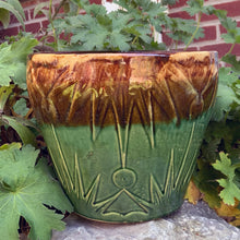 Load image into Gallery viewer, The earth and sky are represented beautifully in this vintage mid-century &quot;Celestial Moon and Star&quot; ceramic garden planter pot featuring embossed starburst suns and moons in brown and green drip glaze. Designed and crafted by Robinson Ransbottom Pottery Company, in Roseville Ohio, USA, circa 1960s. This highly collectible planter will look gorgeous filled with your favourite greenery or flowers. Perfect for the container garden enthusiast!
